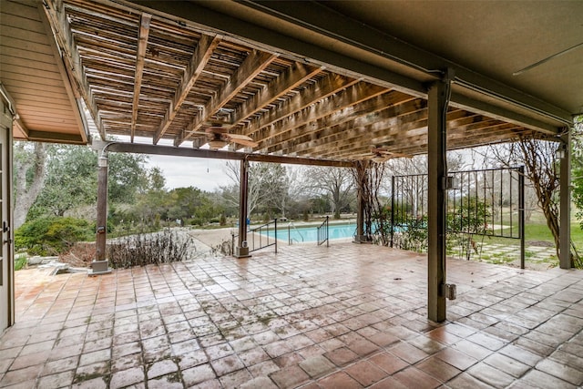 view of patio / terrace featuring an outdoor pool, a ceiling fan, and a pergola