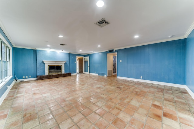 unfurnished living room featuring ornamental molding, recessed lighting, visible vents, and a fireplace