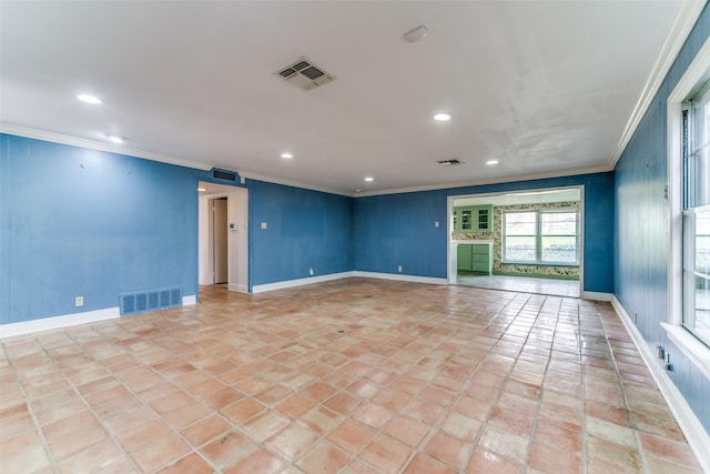 unfurnished room featuring ornamental molding, recessed lighting, visible vents, and baseboards