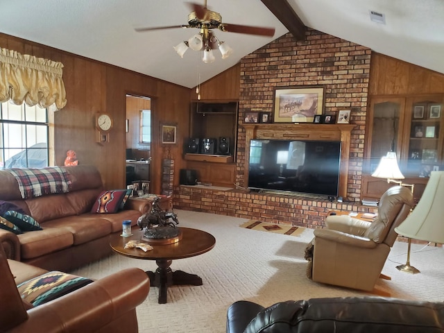 carpeted living room with vaulted ceiling with beams, wood walls, and ceiling fan