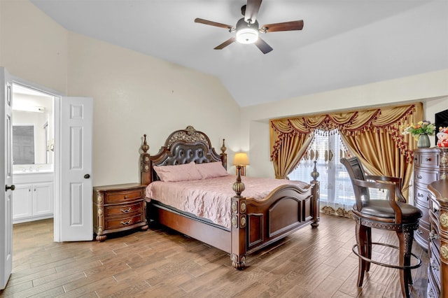 4513 Fairlake Dr, Garland, TX 75043 - bedroom with ensuite bath, light wood-type flooring, vaulted ceiling, and a ceiling fan