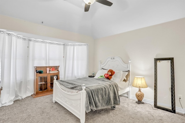 4513 Fairlake Dr, Garland, TX 75043 - bedroom featuring baseboards, light colored carpet, vaulted ceiling, and a ceiling fan