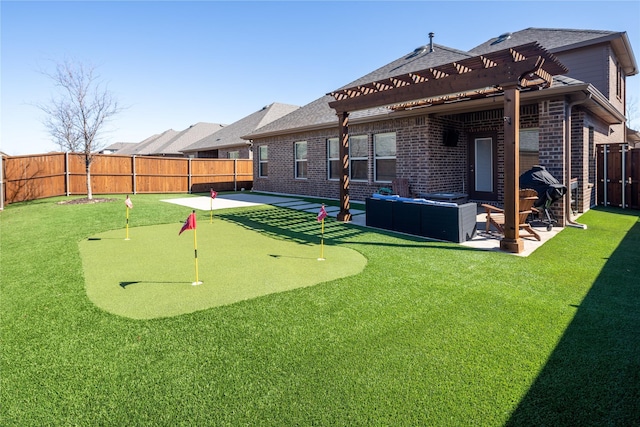 exterior space with a patio area, a fenced backyard, and a pergola