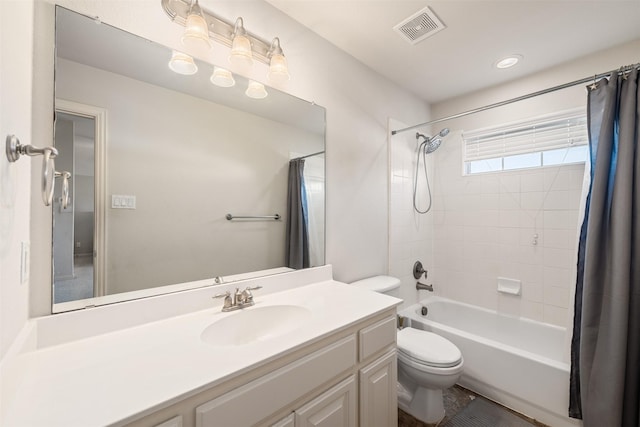 full bathroom featuring visible vents, shower / bathtub combination with curtain, toilet, and vanity