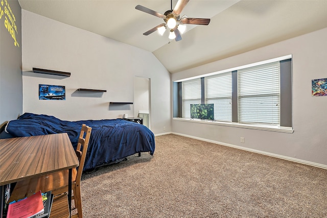 carpeted bedroom featuring vaulted ceiling, a ceiling fan, and baseboards