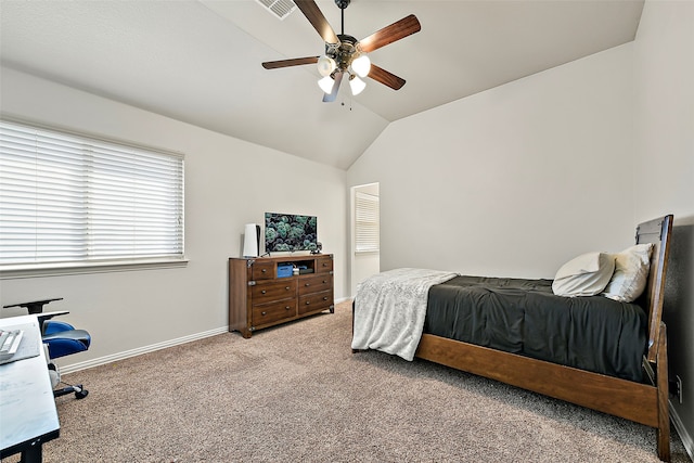 bedroom featuring visible vents, baseboards, ceiling fan, vaulted ceiling, and carpet floors