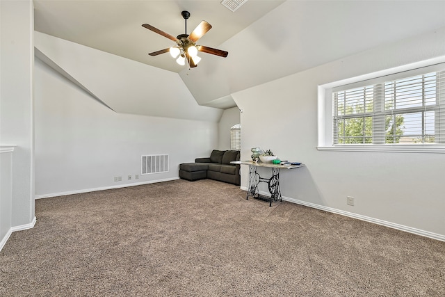 sitting room with visible vents, baseboards, lofted ceiling, ceiling fan, and carpet floors