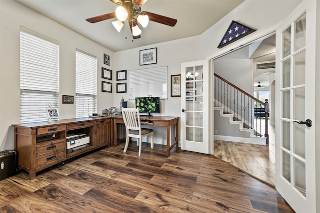 office space featuring a ceiling fan, french doors, and dark wood-style flooring