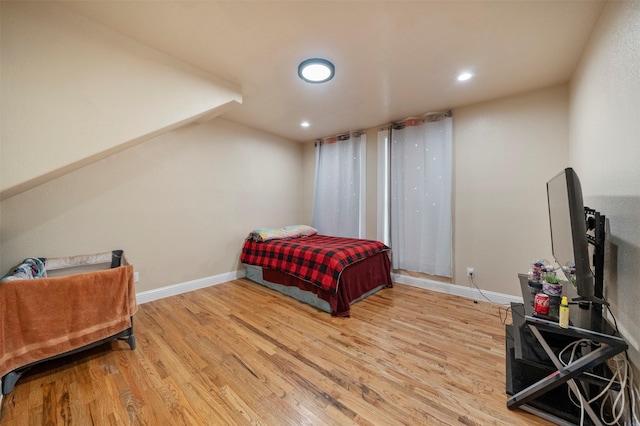 314 S Hastings St, Irving, TX 75060 - bedroom featuring recessed lighting, light wood-style floors, and baseboards