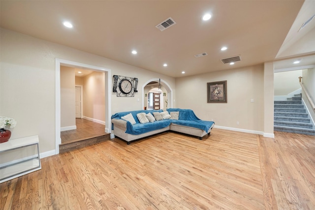314 S Hastings St, Irving, TX 75060 - living area with light wood finished floors, visible vents, recessed lighting, and stairs