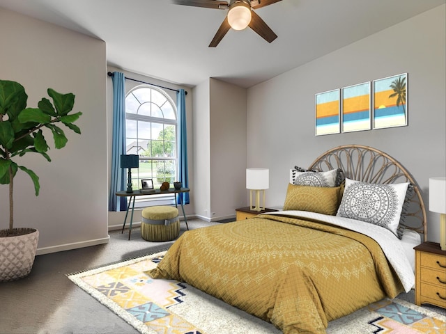 bedroom with ceiling fan, carpet flooring, and baseboards