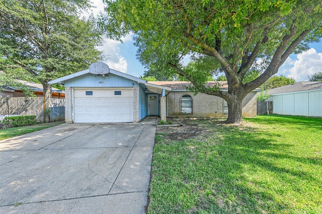 single story home featuring brick siding, concrete driveway, an attached garage, fence, and a front lawn