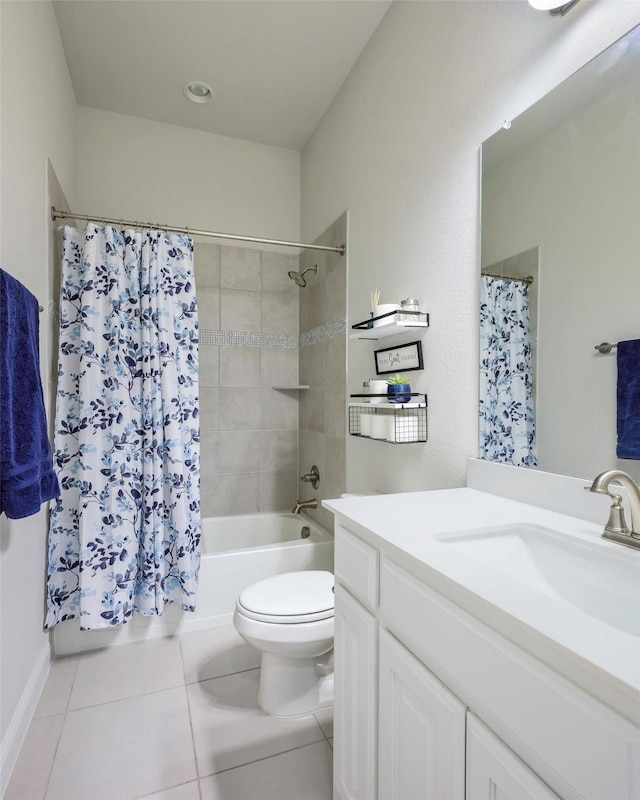 bathroom with tile patterned flooring, shower / bathtub combination with curtain, vanity, and toilet