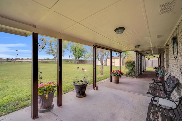 view of patio featuring a fenced backyard and visible vents