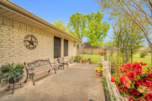 view of patio / terrace with fence