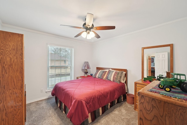 bedroom with ornamental molding, light carpet, ceiling fan, and baseboards