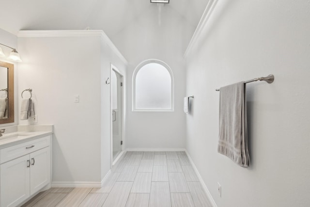 bathroom featuring baseboards and vanity