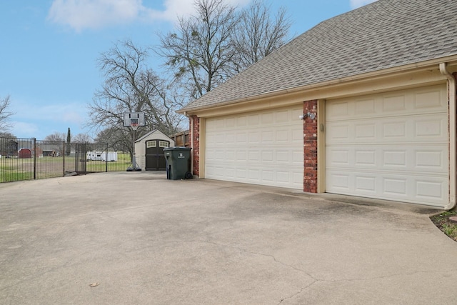 garage with fence