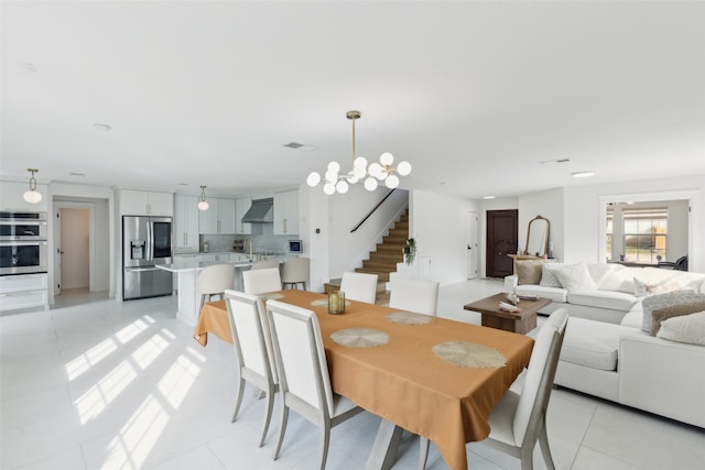 dining area with stairs, light tile patterned flooring, a chandelier, and visible vents