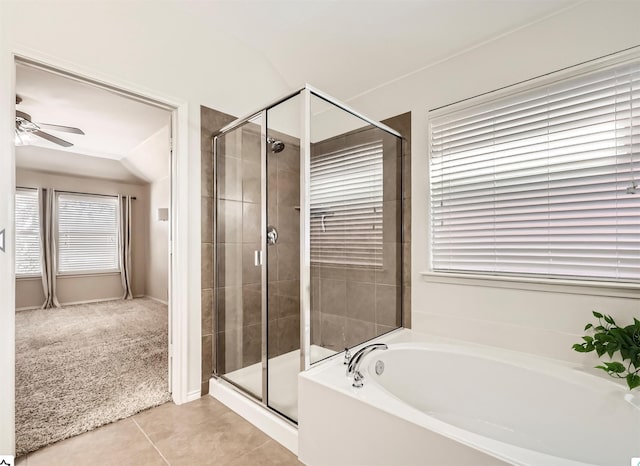 full bath with a bath, tile patterned flooring, a stall shower, and a ceiling fan