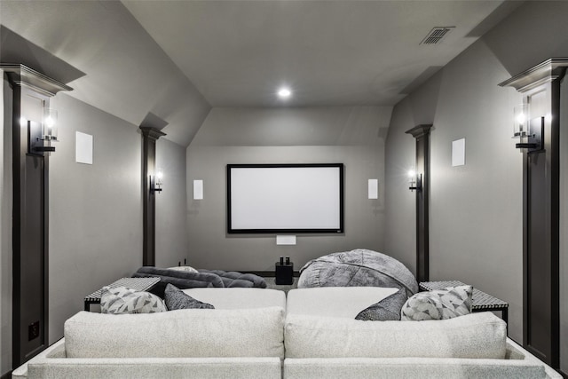 home theater room with ornate columns, visible vents, and recessed lighting