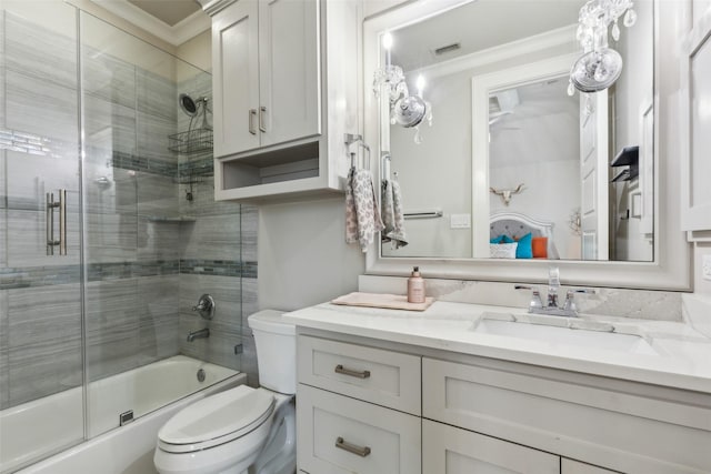 full bath featuring visible vents, toilet, enclosed tub / shower combo, crown molding, and vanity