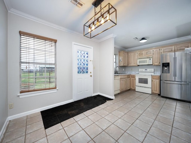 kitchen featuring crown molding, light countertops, visible vents, a sink, and white appliances