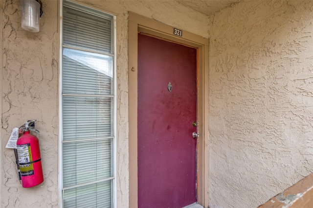 12480 Abrams Rd Unit 321, Dallas, TX 75243 - view of exterior entry featuring stucco siding
