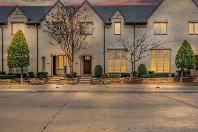 view of front of property with brick siding