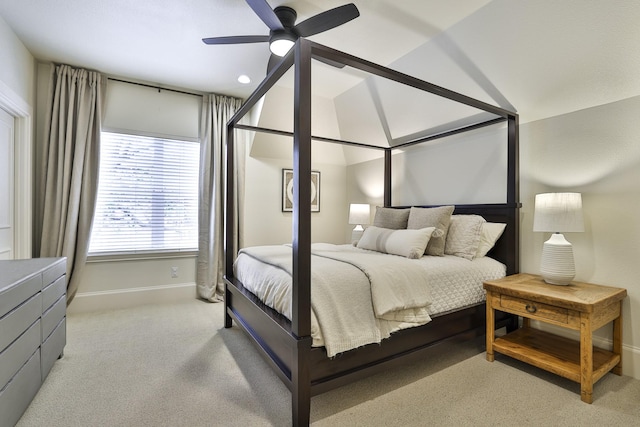 bedroom featuring a ceiling fan, recessed lighting, light colored carpet, and baseboards