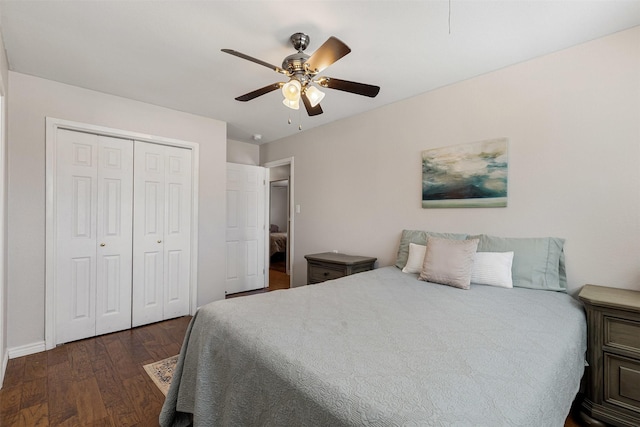 bedroom featuring ceiling fan, a closet, wood finished floors, and baseboards