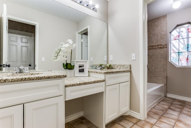 bathroom with baseboards, shower / bath combination, vanity, and tile patterned floors