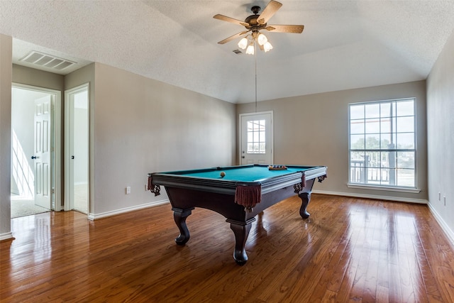 game room with pool table, wood-type flooring, visible vents, and vaulted ceiling