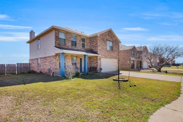 traditional-style home with an attached garage, brick siding, fence, driveway, and a front yard