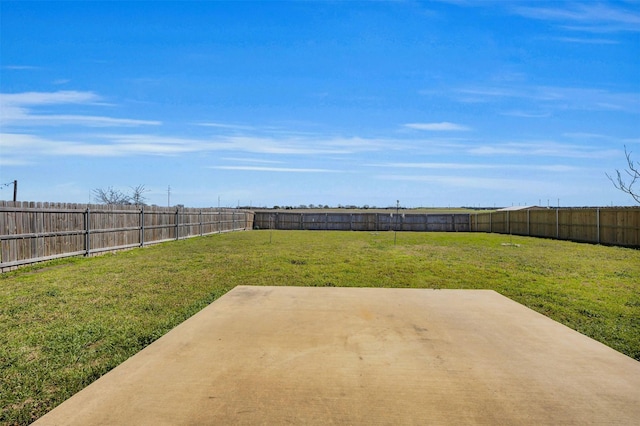 view of yard featuring a patio area and a fenced backyard