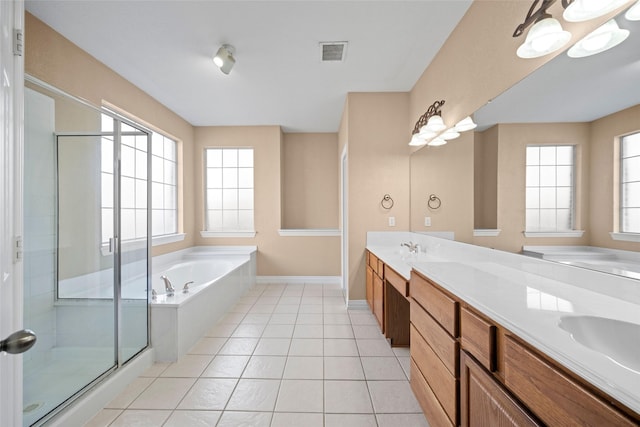 bathroom with tile patterned flooring, visible vents, a shower stall, a bath, and double vanity