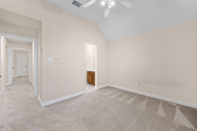 unfurnished bedroom featuring light carpet, visible vents, baseboards, vaulted ceiling, and attic access