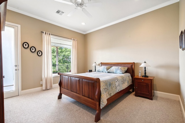 bedroom featuring baseboards, visible vents, carpet flooring, and ornamental molding