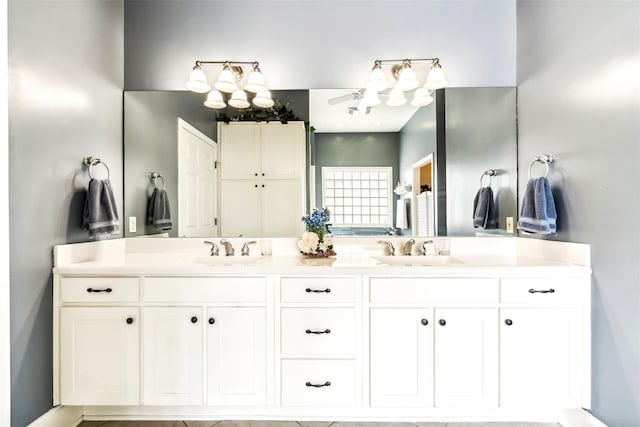 bathroom with double vanity and a sink