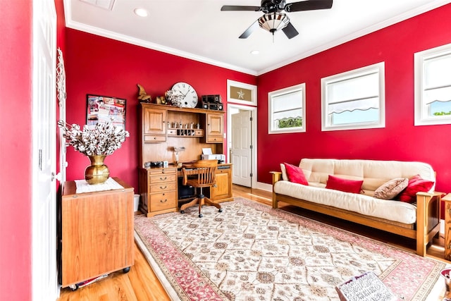 office space featuring light wood-type flooring, ceiling fan, ornamental molding, and recessed lighting