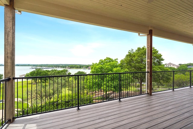 wooden deck with a water view