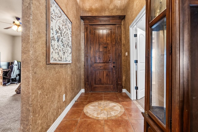 110 Bolivar Dr, Weatherford, TX 76085 - entrance foyer featuring a ceiling fan, baseboards, and tile patterned floors
