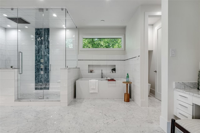 full bath with a stall shower, visible vents, a freestanding bath, and vanity