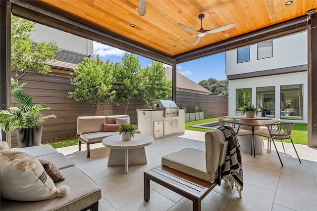 view of patio / terrace with ceiling fan, a fenced backyard, a grill, an outdoor living space, and outdoor dining space