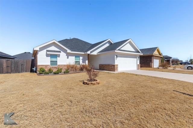 ranch-style home featuring a garage, concrete driveway, brick siding, and fence