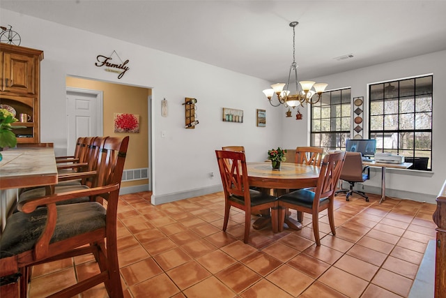 dining room with visible vents, baseboards, light tile patterned flooring, and a chandelier