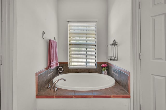 bathroom with a garden tub