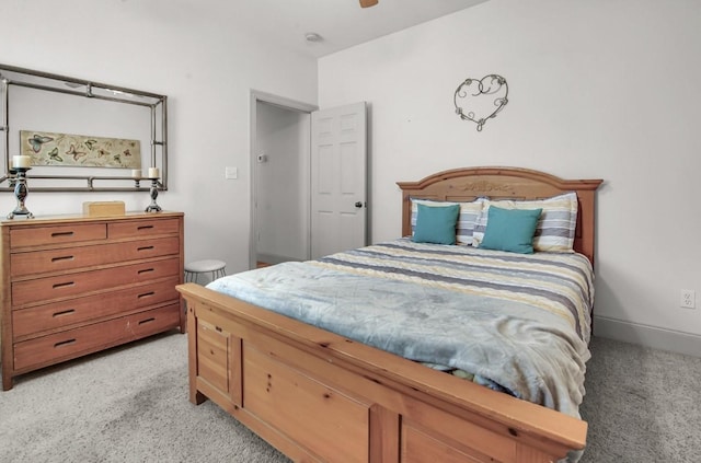 bedroom with baseboards, light carpet, and ceiling fan