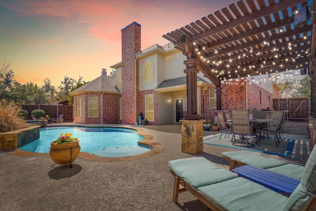 pool at dusk featuring a patio, a fenced in pool, a fenced backyard, and a pergola