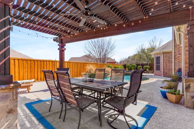 view of patio / terrace with a fenced in pool, outdoor dining area, a fenced backyard, a pergola, and ceiling fan